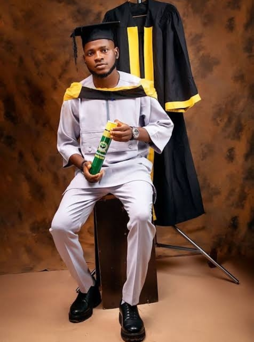 Nigerian man celebrates his master's degree after being recognized as one of the best students